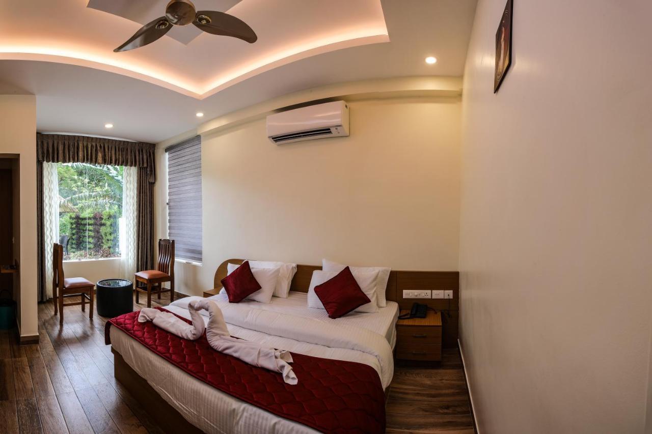 Thenmala Hormuz Inn Kolattupuzha Esterno foto